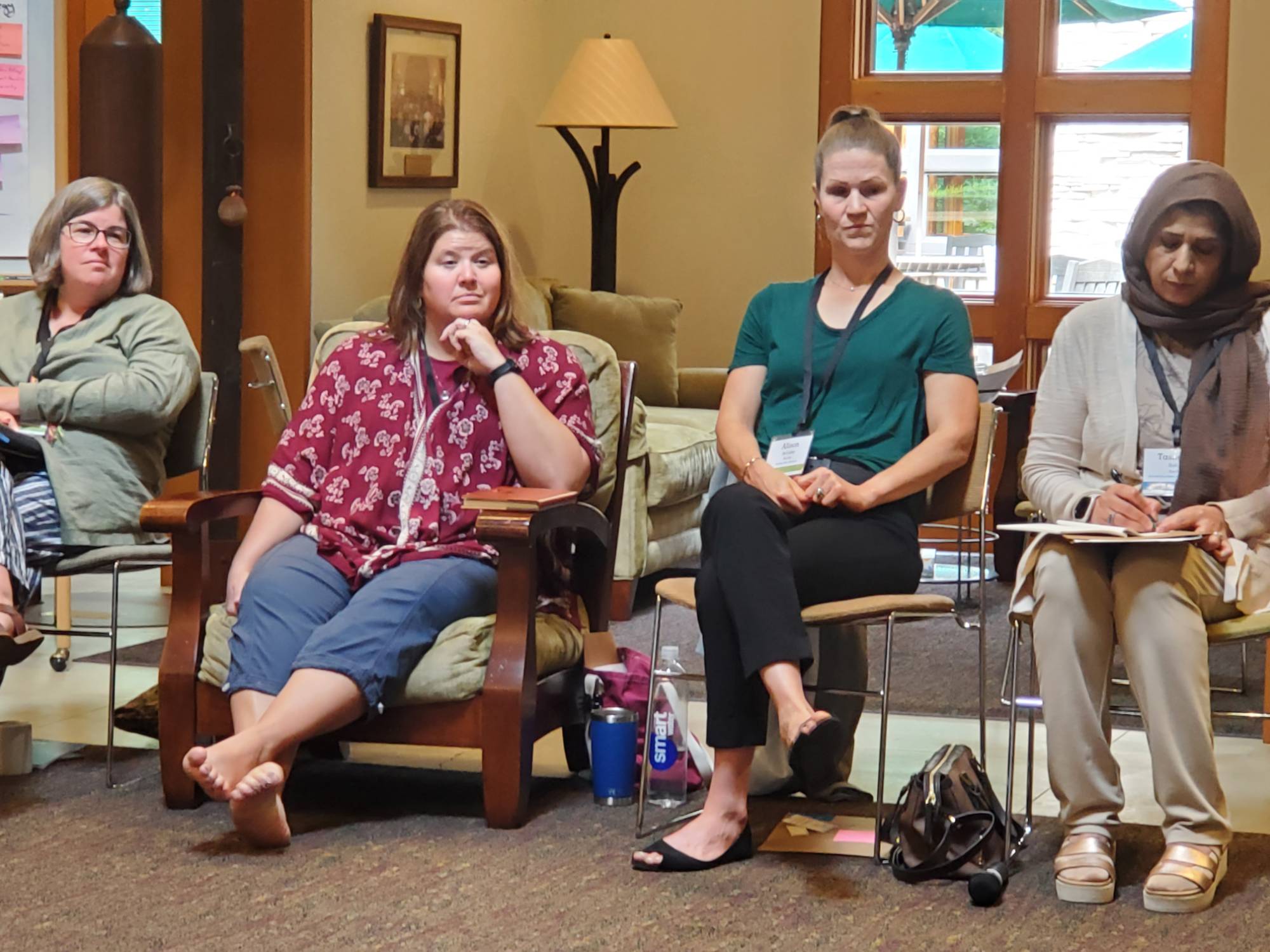 Four women talking in a planning session